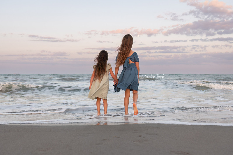 fun family photos on Cocoa Beach at sunset