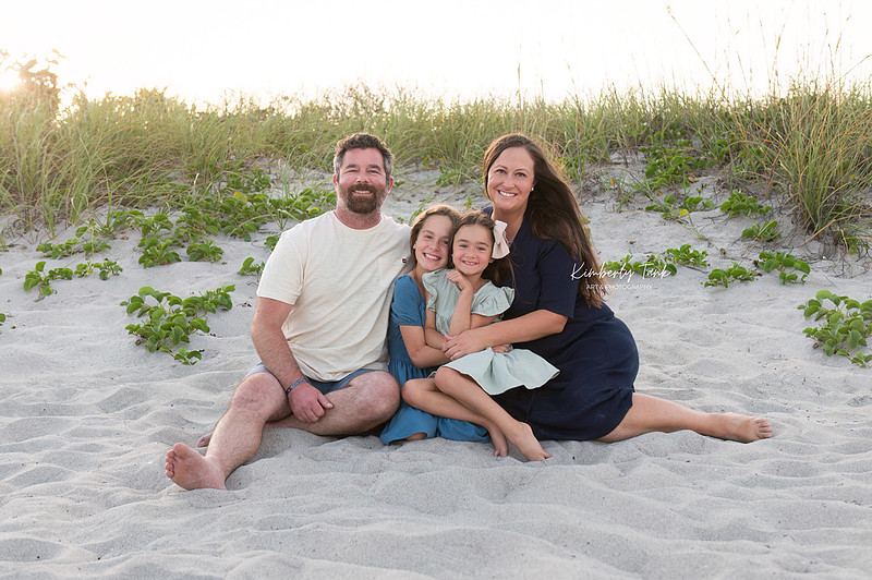fun family photos on Cocoa Beach at sunset