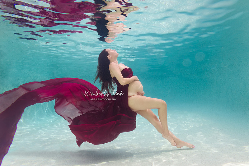 underwater maternity photo in pool