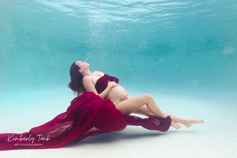 underwater maternity photo in pool