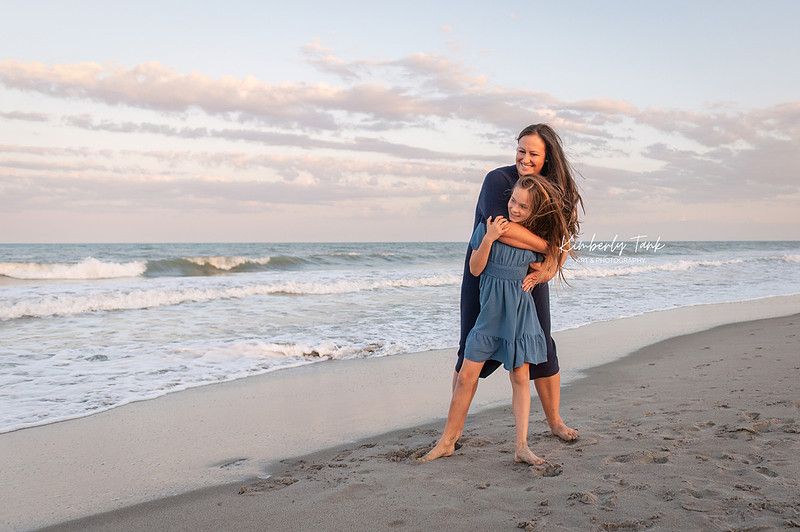 fun family photos on Cocoa Beach at sunset