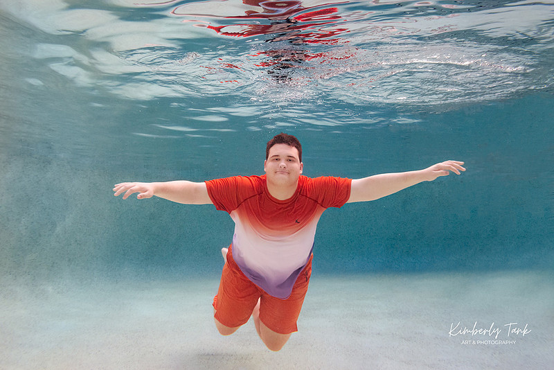 underwater high school senior boy