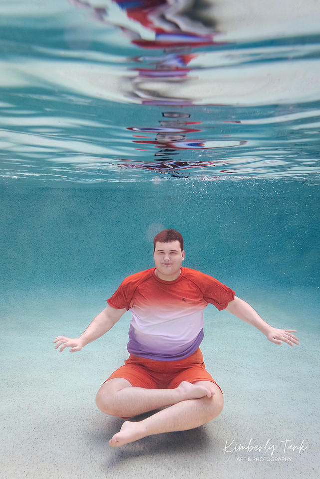 underwater high school senior boy