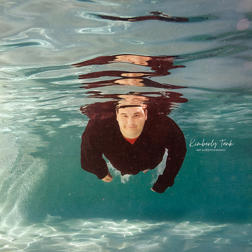 underwater high school senior boy
