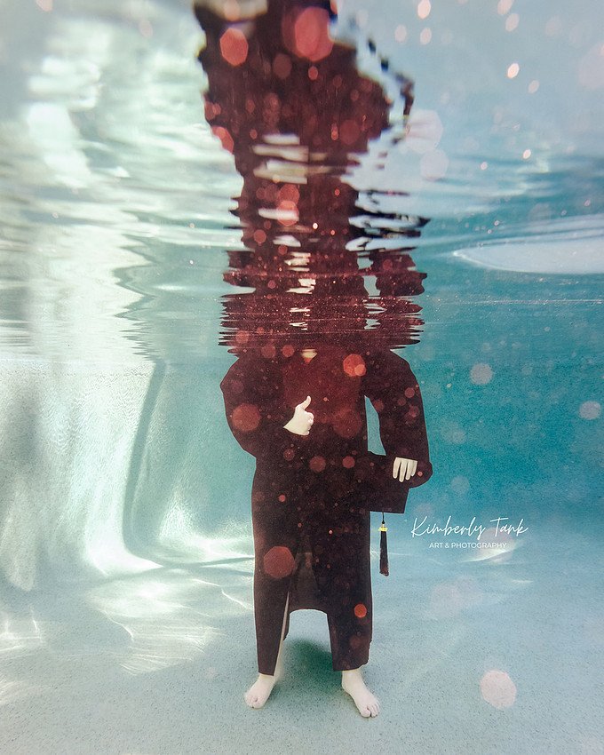 underwater high school senior boy
