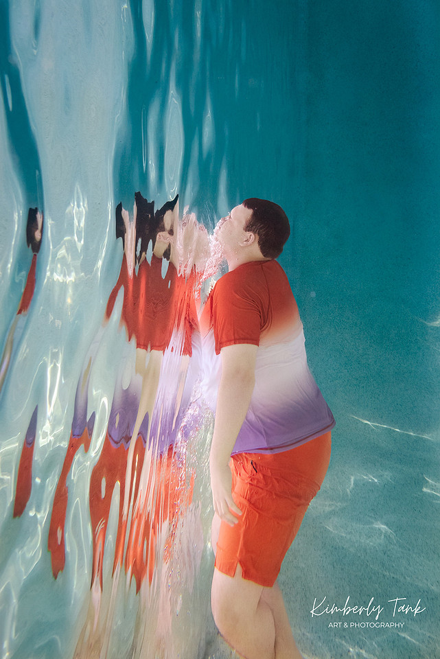 underwater high school senior boy
