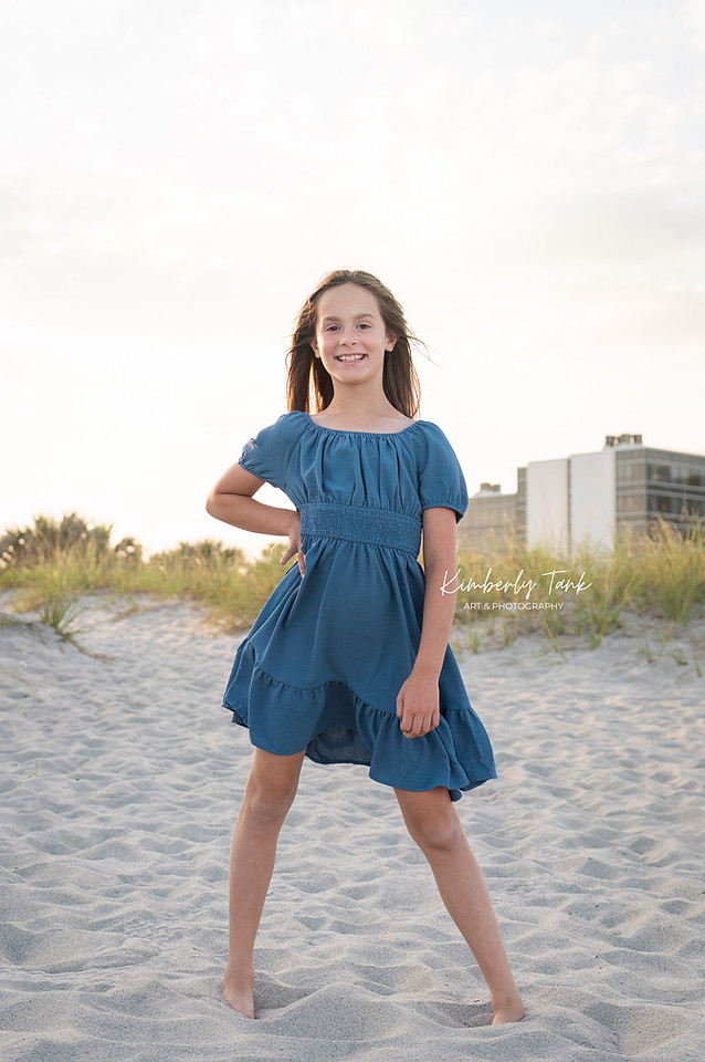fun family photos on Cocoa Beach at sunset