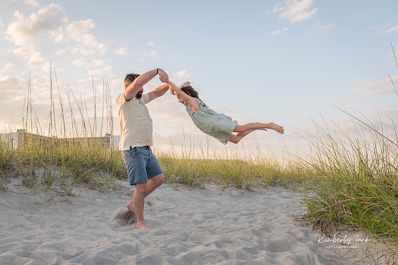fun family photos on Cocoa Beach at sunset