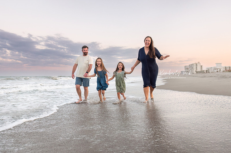 fun family photos on Cocoa Beach at sunset