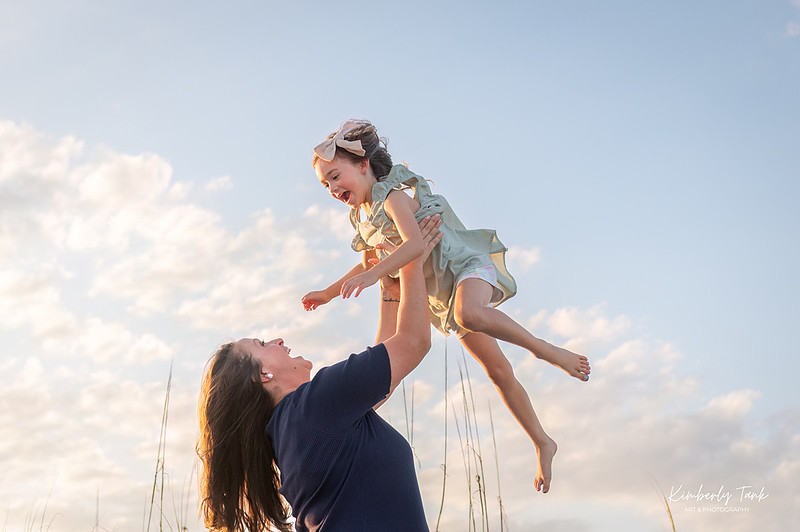 fun family photos on Cocoa Beach at sunset